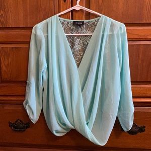 3/4 sleeve dressy shirt. Lace back, sea green color. Brand A. Byer. Size small